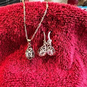 .925 sterling silver and white sapphire necklace and earring